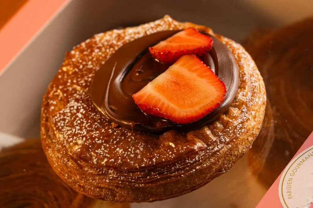Strawberry and chocolate danish from Parisien Gourmandises, a La Jolla bakery, in warm light