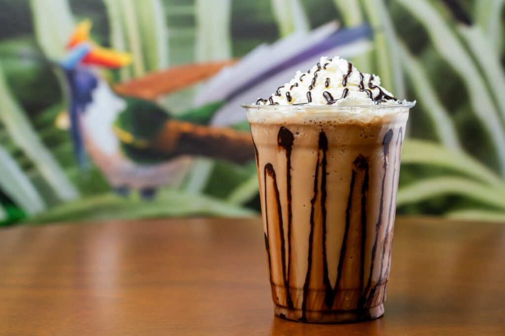Cafe menu product photo of a mocha frappe with whipped cream