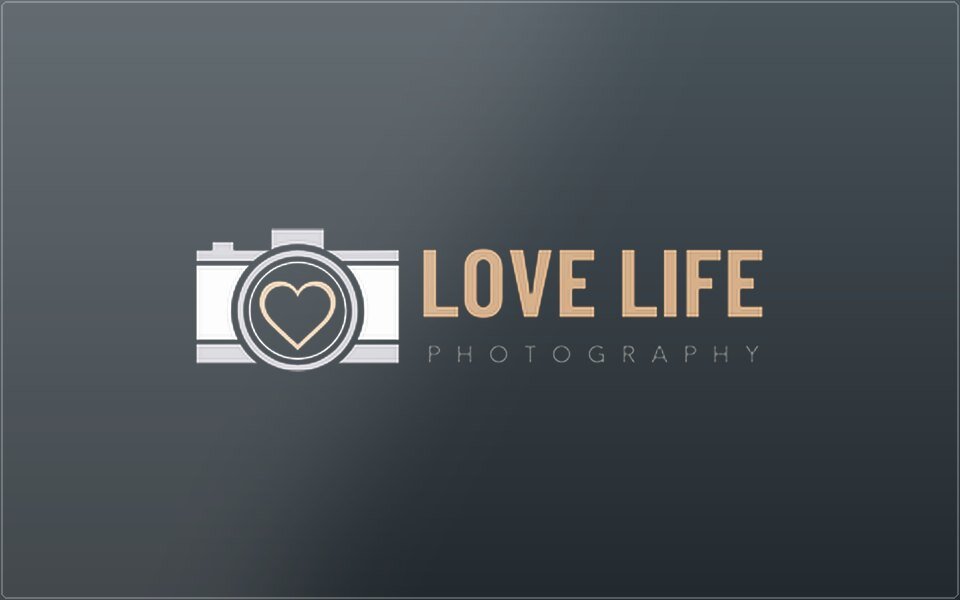 Love Life Photography logo on a charcoal glass plate