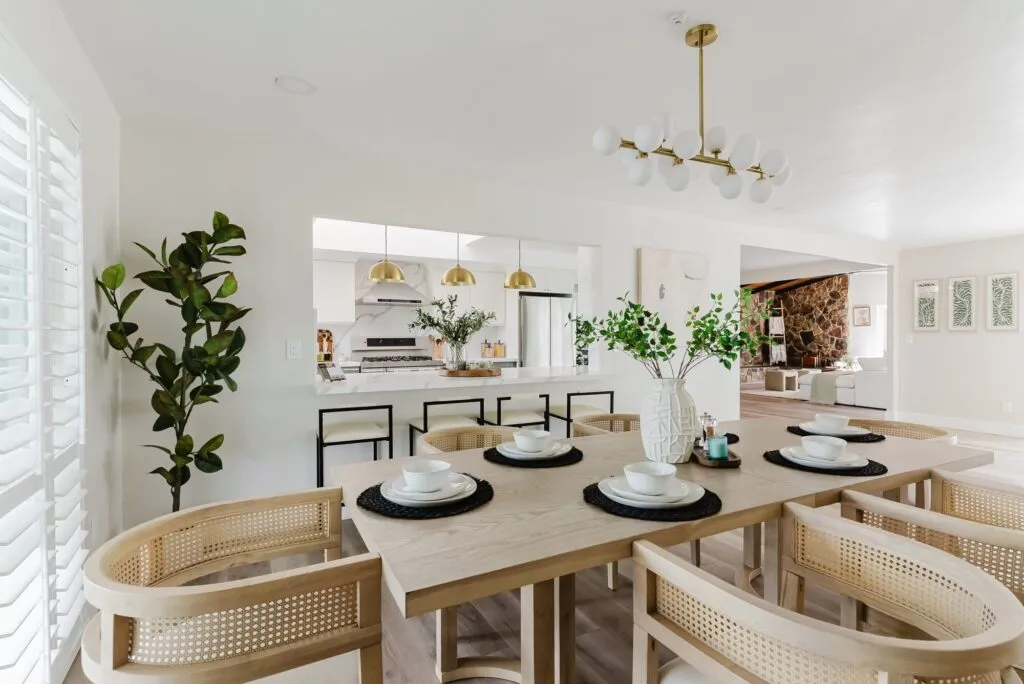 Dining room set for dinner in a staged La Mesa listing