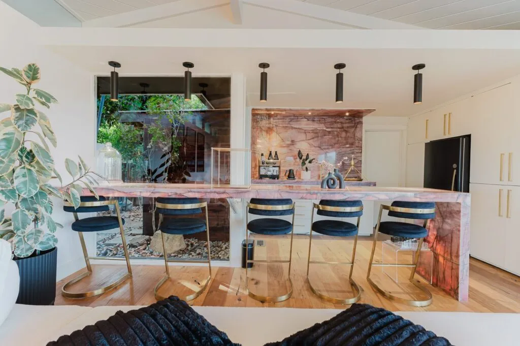 Kitchen bar with a stone island in a Point Loma rental home